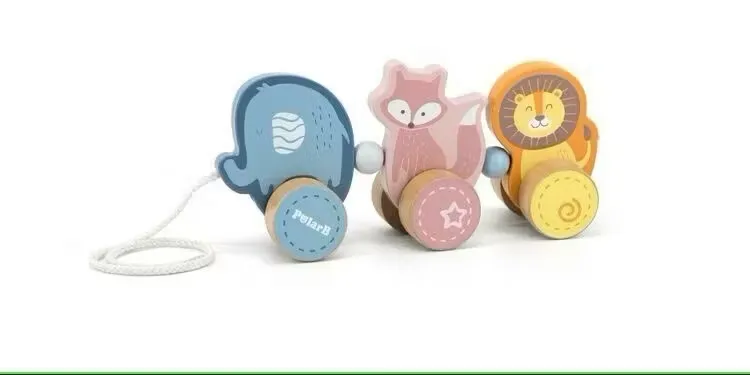 Dragleksak djur i trä